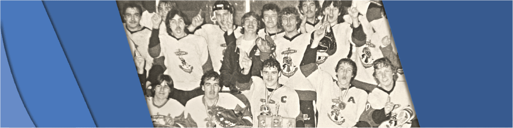 Group photo of the Selkirk Jr. B fisherman players celebrating and holding a trophy