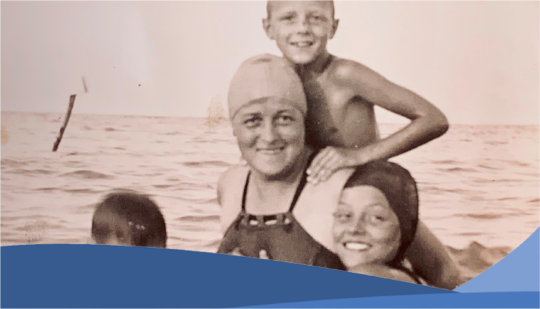 Ruth Hooker swimming with her three children
