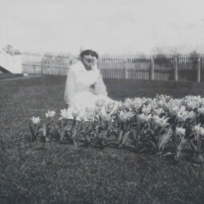 Nurse Blanche Coutts in the 'Airing Court' of Main Building, 1920, Selkirk Mental Health Centre Archives Nurse