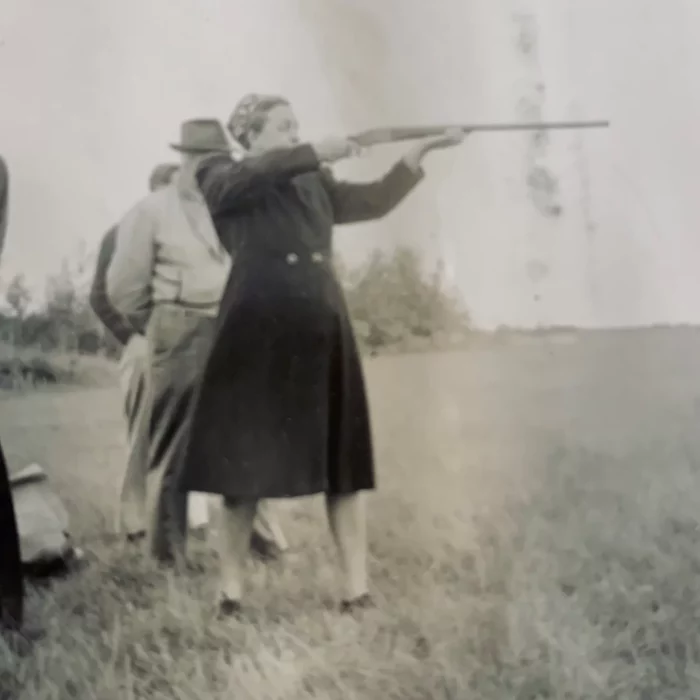 Ruth Hooker Aiming, Date Unknown, Joen Hadfield Black and white picture of Ruth Hooker shooting a large gun