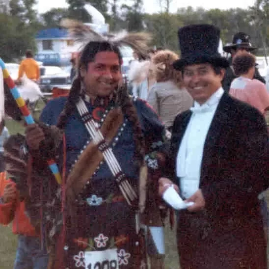 Dennis Francis and Bill Shead at Selkirk Centennial Pow Wow in Selkirk Park, 1982, Bill Shead An indigenous man in traditional dressing with Bill Shead at a powwow in Selkirk Park