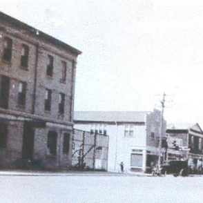 Soutwest View of Manitoba Avenue, Gibbs' Drug Store in the Middle with the Peaked Roof, 1945, A Magical Place Hugh H. Gibbs Black and white southwest view of Manitoba avenue