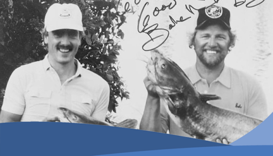 Catching Catfish BW Black and white portrait of two men holding fish