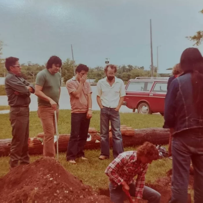 Digging the Hole for the Totem Pole, c1970, Selkirk Friendship Centre Coloured view of men digging a hole for a totem pole in the Selkirk friendship centre yard