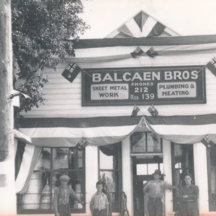 Fair Parade Balcaen Bros, 1930, Ted Francis Black and white picture of the front of Balcaen Bro's sheet metal work shop