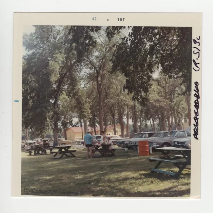 Picnicers at Selkirk Park, 1969, Archives of Manitoba Recreation Selkirk R-S-3c6 Picnic tables under the trees in the Selkirk park