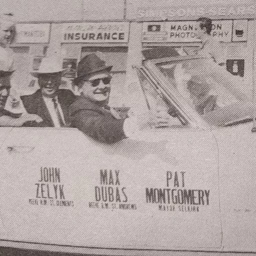 Fair Parade, 1964, Selkirk Enterprise Centennial Edition Black and white portrait of men sitting in a car in the parade