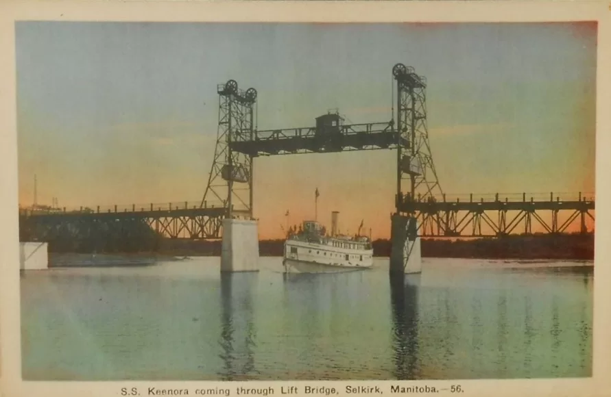 Scaled view of the Keenora passing under the lifted bridge