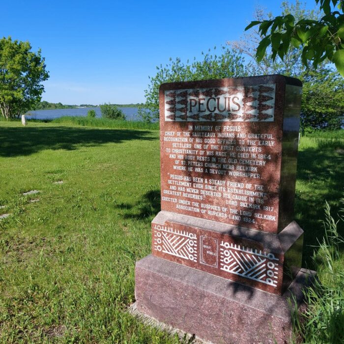 Peguis Gravestone, 2022, Selkirk Museum Collection Gravestone marked Peguis on a sunny day