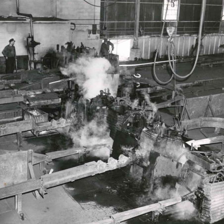 Rolling Bars Physically Moving Bars by Employees, Date Unknown, Gerdau Men manually working with large bars at Gerdau