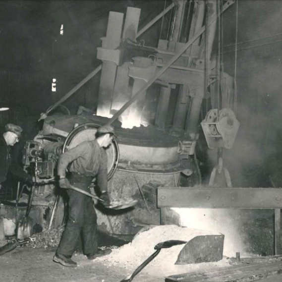 Rolling Mill, Date Unknown, Gerdau Indoor view of men shoveling coal into a fire at Gerdau