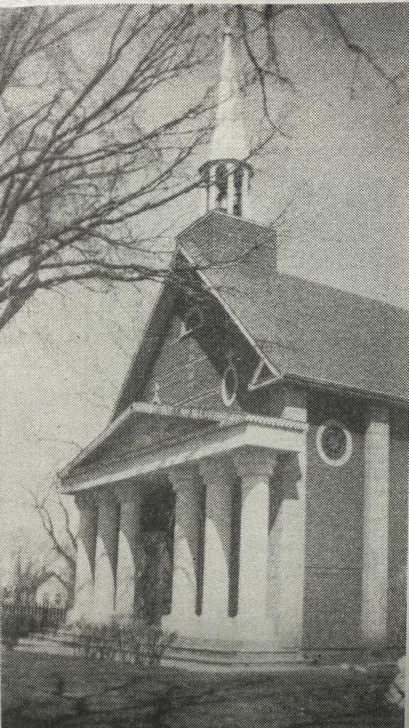 Black and white side view of the Notre Dame Catholic church in 1970