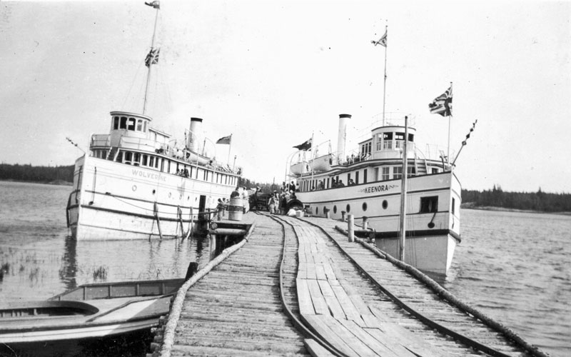 Black and white picture of the Keenora and Wolverine docked