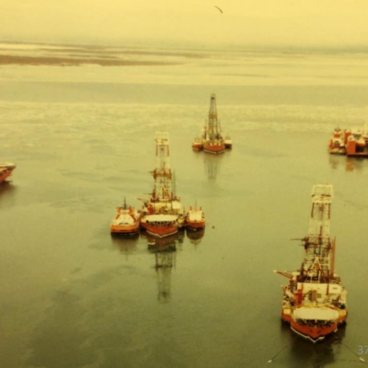 Tuktoyaktuk Building Support Barges, Date Unknown, Fraser Stewart Support building materials being transported by ships