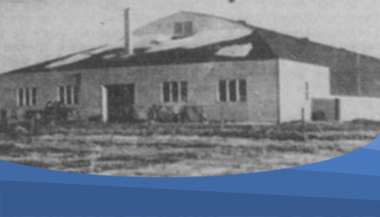 Black and white photo of the exterior of the Selkirk Arena