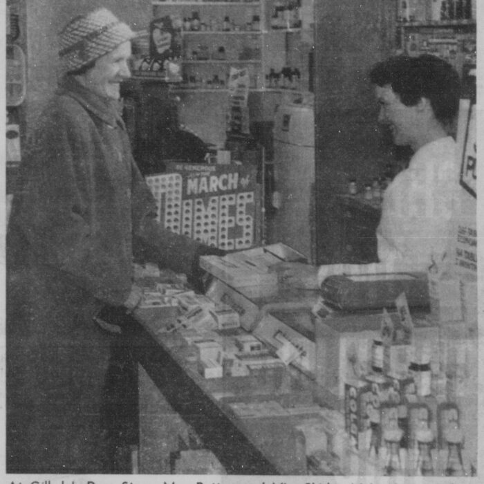 Mrs. Patton and Miss Shirley McLeod at Gilhuly’s Drug Store, February 11 1959, Selkirk Enterprise Newspaper clipping of a black and white image of two women at the drug store.