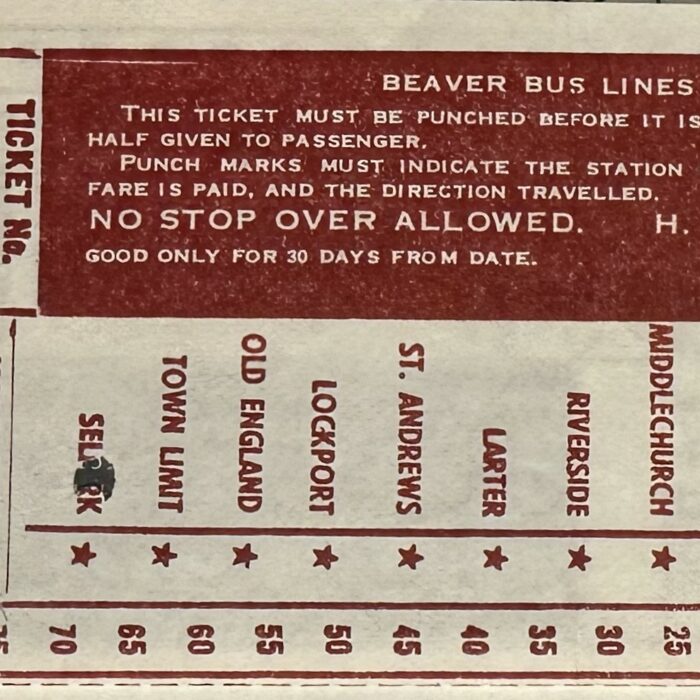 Beaver bus line ticket with holes pinched into the ticket from visitors travel