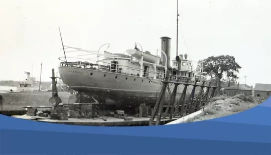 Black and white photo of the Bradbury in the dry dock