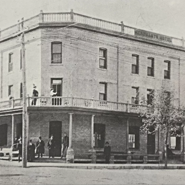 Merchant Hotel, 1913, Archives of Manitoba Black and white photo of the Merchants Hotel exterior with gentleman standing outside