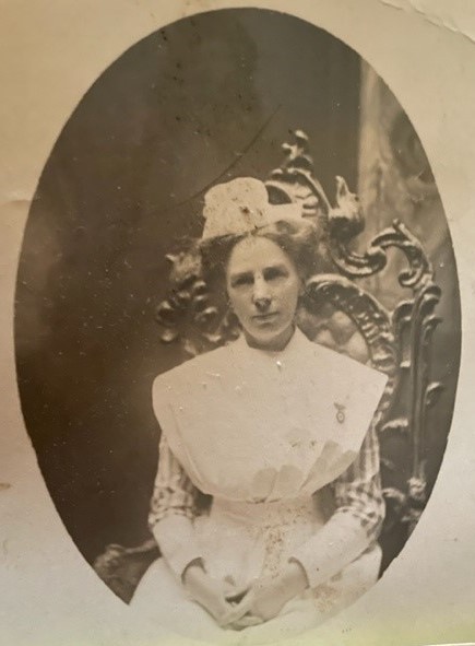 Portrait of a woman sitting on a chair