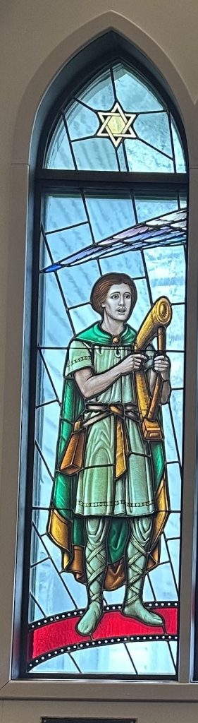 Window shows David wearing green robes