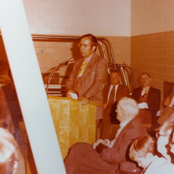 Dr. Bill Rozecki at Selkirk Community Pool Opening, 1975, Kinsmen Scrapbook Selkirk Museum Collection Dr. Bill Rozecki at Selkirk Community Pool Opening standing at a podium