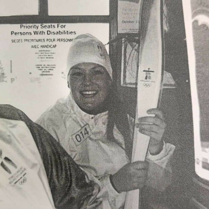 Lynn Kolba, 2010, Michelle Stamm Lynn Kolba holding the 2010 Olympic Torch