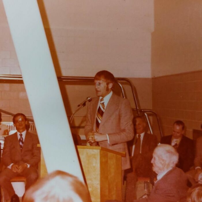M.P. Dean Whiteaway at Selkirk Community Pool Opening, 1975, Kinsmen Scrapbook Selkirk Museum Collection M.P. Dean Whiteaway at Selkirk Community Pool Opening standing at a podium