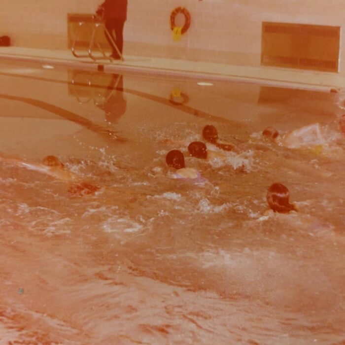 Students and Father Art Seaman Swim in the Pool at the Selkirk Community Pool Opening, 1075, Kinsmen Scrapbook Selkirk Museum Collection Students and Father Art Seaman Swim in the Pool at the Selkirk Community Pool Opening