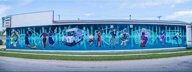 This photo shows dancing, The Metis Music Van, musical notes, instruments and many bright colors.