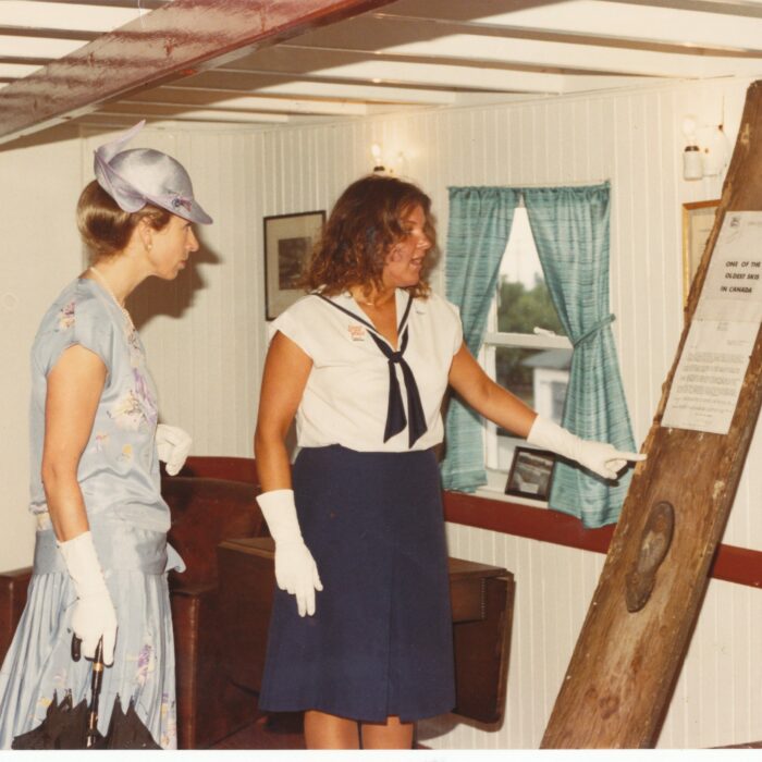 Nancy Noron (Lovenjak) with Princess Anne, July 1982, Marine Museum of Manitoba Colour image of Princess Ann and Nancy Noron. Nancy is showing the Princess a display