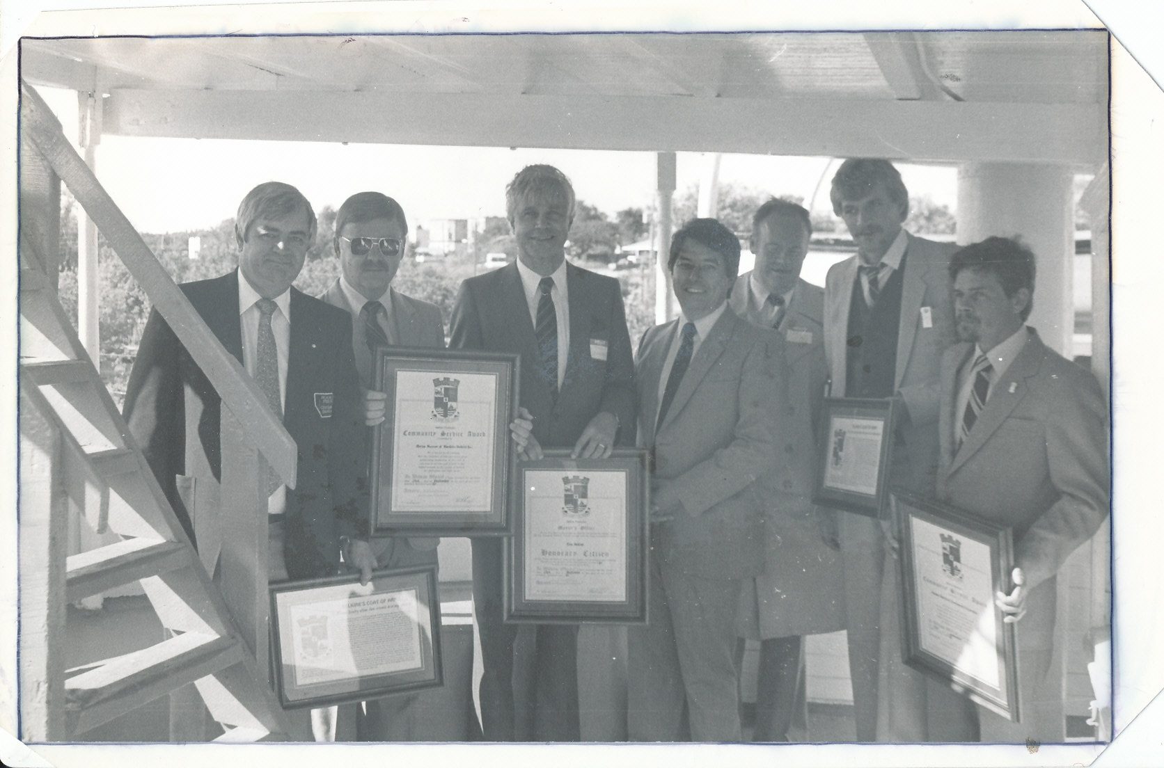 Black and white image of important individuals present at the opening of the Marine Museum