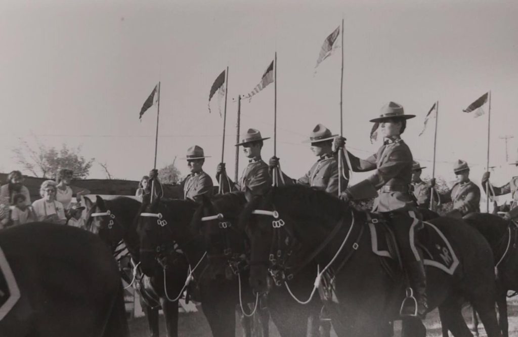 Black and white image of the RCMP musical ride