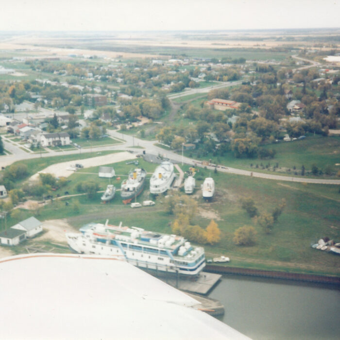 Aerial colour photograph of the Marine Museum. The photo shows the wing of the airplane and the Museum in the distance