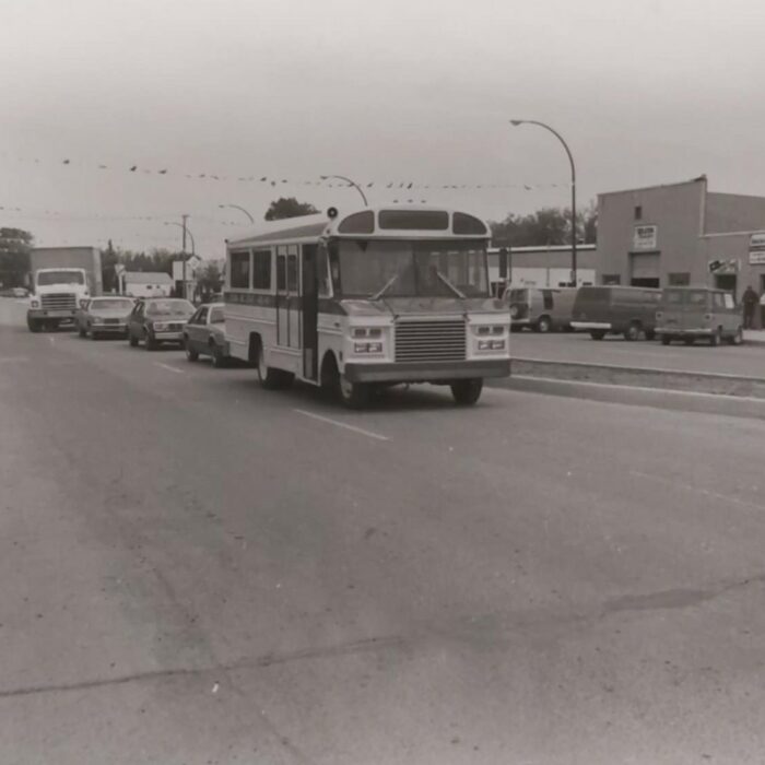 Selkirk Centennial Parade, 1982, Selkirk Museum Collection Black and white image of a bus driving down the road