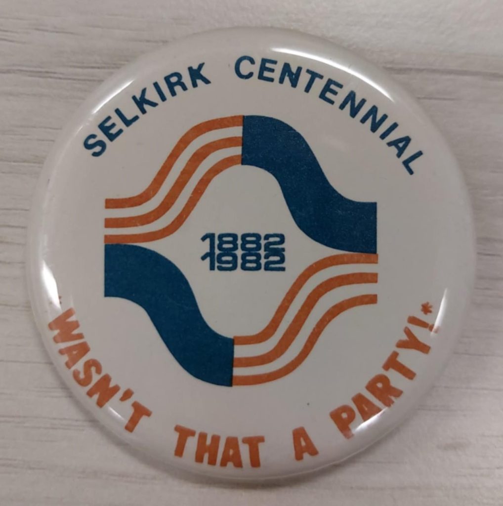 Selkirk Centennial Pin with text that says 'Selkirk Centennial 1882-1982 Wasn't that a party!'