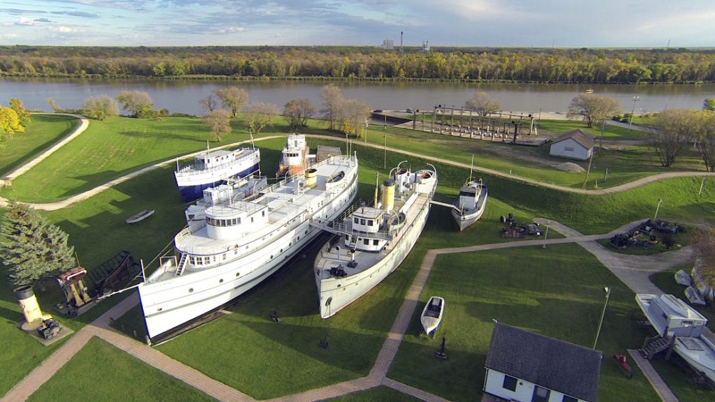 Colour aerial image of the Marine Museum. The sun is shining on the boats