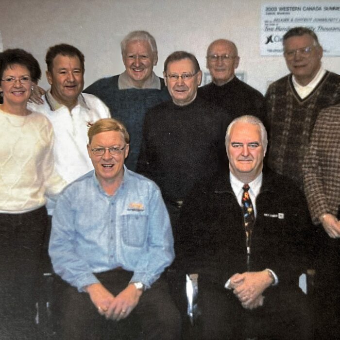 Board of Directors, Russ Skalesky, Ray Anderson, Otto Gebhardt, George Plews, Bud Oliver, Leslie Hanson, Bob Jefferson, Bruce Harris, 2004, Selkirk District Community Foundation A group of people stand and sit together for a photo. The people are the Board of Directors of the SDCF