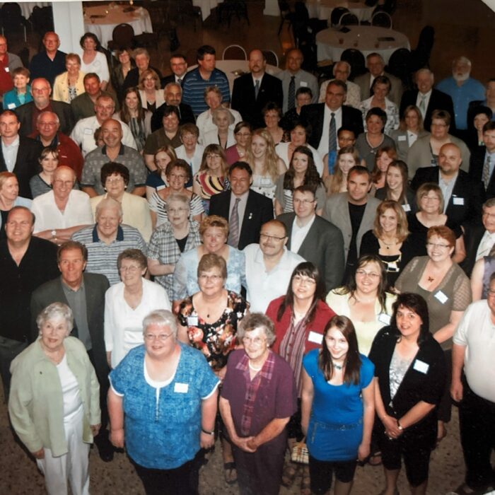 Grant Gala Attendees, 2014, Selkirk District Community Foundation A large group of people clustered together. They all look up at the camera as the photo is taken from above