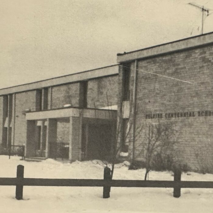 Selkirk Centennial School Built in 1967, Date Unknown, Lord Selkirk School Division No. 11 25th Anniversary Calendar Black and white photo of Centennial School in the winter time