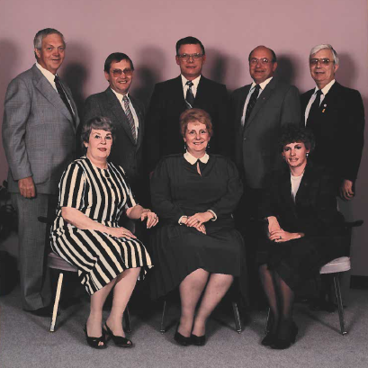 Selkirk Town Council, 1986-1989, Selkirk Museum Collection Colour image of a group of people sitting and standing posing for a picture