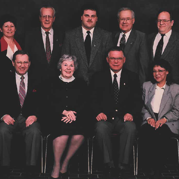 Selkirk Town Council, 1995-1998, Selkirk Museum Collection Colour image of a group of people sitting and standing posing for a picture