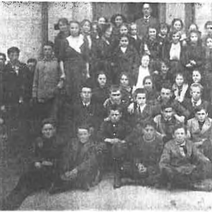 Central School Class Photo, 1912-1913, Selkirk's 75th Anniversary A black and white photo of a group of people seated and standing together
