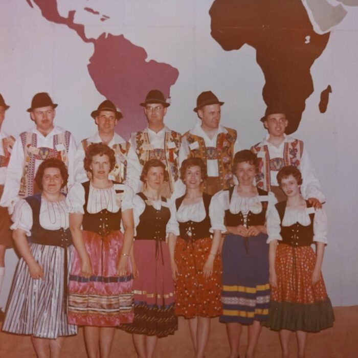 Colour image of a group of people dressed up in traditional German attire