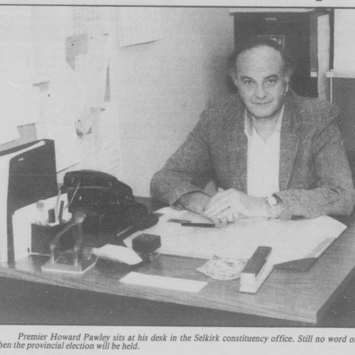 Premier Howard Pawley Sits at His Desk in the Selkirk Constituency Office, 1985, Selkirk Journal Premier Howard Pawley Sits at His Desk in the Selkirk Constituency Office