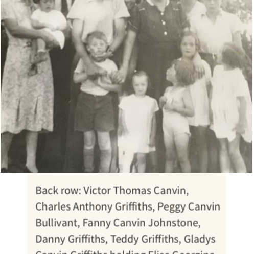 Charles Griffiths Family Photo, c1940, Canadian Virtual War Memorial A black and white image of a family grouped together. There are young children and a baby in a woman's arms.