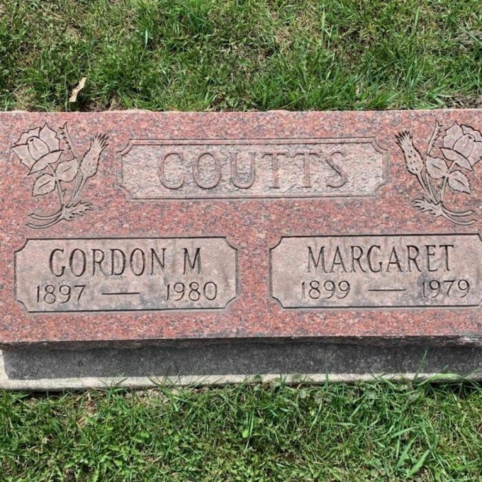 Gordon M. Coutts, 2022, Find A Grave Colour image of a gravestone. The stone is red and has the family name 'Coutts' at the top. Underneath is 'Gordon M. and Margaret'