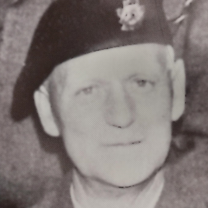 Gordon Milne Coutts, 1939-1945, Coutts Family A black and white image of a man in military uniform. The photo is taken from the shoulders up. The man looks at the camera