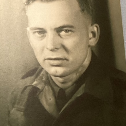 Harold Henrikson, 1939-1946, Icelandic Collection, Elizabeth Dafoe Library, University of Manitoba A black and white image of a man wearing a military jacket. He looks at the camera unsmiling. The photo is taken from the chest up