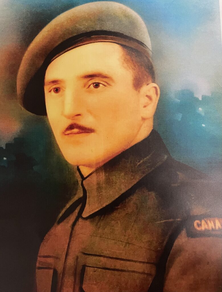 Colour image of a painting of a man in military uniform. He looks to the left of the camera. He has a mustache and a badge on his shoulder which says 'Canada'